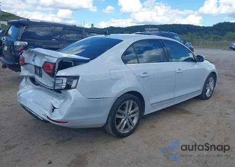 2017 Volkswagen Jetta 1.8T Sel/1.8T Sel Premium z USA, uszkodzony, nr VIN 3VWL17AJ2HM338922